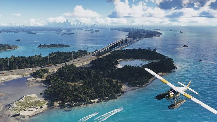 Seaplane flying over turquoise water, mangrove islands and a causeway toward the Vice City skyline in Grand Theft Auto VI